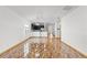 Bright living room featuring ceramic tile flooring and access to the kitchen at 3345 Reedy Glen Dr, Kissimmee, FL 34758