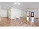 Bright living room featuring ceramic tile flooring and sliding door access to the outside at 3345 Reedy Glen Dr, Kissimmee, FL 34758