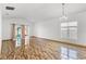 Bright living room featuring tile floors and sliding door access to outdoors at 3345 Reedy Glen Dr, Kissimmee, FL 34758