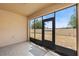 Outdoor patio featuring a screened in patio with views of the backyard at 3345 Reedy Glen Dr, Kissimmee, FL 34758