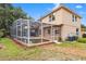 Expansive backyard featuring a pool and enclosed patio at 3468 Woodley Park Pl, Oviedo, FL 32765