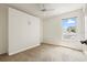Bedroom with built-in wall unit and window for ample natural light at 3468 Woodley Park Pl, Oviedo, FL 32765