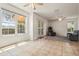 Bright living room featuring sliding glass doors and ample natural light at 3468 Woodley Park Pl, Oviedo, FL 32765