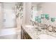 Bathroom featuring granite countertop, double sinks, bathtub, and shower with a shower curtain at 3617 Fort Mellon Ln, Sanford, FL 32773