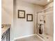 Secondary bathroom with a glass shower door, granite countertop and neutral-colored walls at 3617 Fort Mellon Ln, Sanford, FL 32773