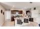 Stylish kitchen featuring stainless steel appliances, granite countertops and island seating at 3617 Fort Mellon Ln, Sanford, FL 32773
