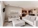 Comfortable living room with neutral furniture and an open layout to the kitchen at 3617 Fort Mellon Ln, Sanford, FL 32773