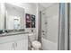 Well-lit bathroom featuring a shower-tub combo and a modern vanity at 3641 Fort Mellon Ln, Sanford, FL 32773
