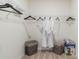 Organized walk-in closet with shelving and hanging space for clothes and accessories at 3641 Fort Mellon Ln, Sanford, FL 32773