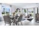 Cozy dining area with table and seating, offering a seamless transition to the living room at 3641 Fort Mellon Ln, Sanford, FL 32773