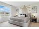 Serene main bedroom featuring a large window, stylish decor, and a comfortable bed at 3641 Fort Mellon Ln, Sanford, FL 32773