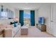 Inviting living room with plush sofa, stylish decor, and a window offering views of the neighborhood at 3846 Royal Azalea Way, Sanford, FL 32773