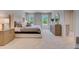 Bright main bedroom with soft carpet, elegant furnishings, and natural light at 3846 Royal Azalea Way, Sanford, FL 32773