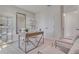 Bright office featuring modern desk, shelving, and comfortable seating at 3846 Royal Azalea Way, Sanford, FL 32773