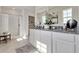 Bright bathroom with granite countertops, double sinks, and a glass-enclosed shower at 3850 Royal Azalea Way, Sanford, FL 32773