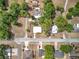 Overhead aerial view of the property showing the layout with street access and surrounding homes at 398 Rose St, Umatilla, FL 32784