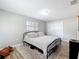 This bedroom has laminate floors and a closet at 398 Rose St, Umatilla, FL 32784