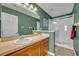 This bathroom features a shower, vanity, neutral tones, and tile flooring at 5102 Monticello Heights Ln, Oviedo, FL 32765