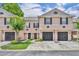 Charming townhome with a well-maintained lawn and a one-car garage in a desirable neighborhood at 5102 Monticello Heights Ln, Oviedo, FL 32765
