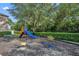Community playground featuring mature landscaping and an assortment of -safe playground toys at 5102 Monticello Heights Ln, Oviedo, FL 32765