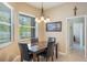 Bright breakfast nook features ample natural light and a view of the backyard at 530 Heatheroak Cv, Altamonte Springs, FL 32714