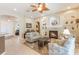 Inviting living room with a fireplace, built-in shelving, and an open floor plan at 530 Heatheroak Cv, Altamonte Springs, FL 32714