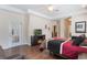 A main bedroom with wood floors, neutral colors and a door that leads to the patio at 530 Heatheroak Cv, Altamonte Springs, FL 32714