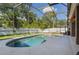 The backyard shows the pool and the enclosed lanai at 530 Heatheroak Cv, Altamonte Springs, FL 32714