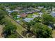 Overhead shot featuring the layout of a neighborhood with pools, green spaces, and homes at 5583 Miles Dr, Port Orange, FL 32127