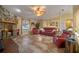 Spacious living room with fireplace, tile floors and plenty of room for seating at 5583 Miles Dr, Port Orange, FL 32127