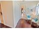 Bright hallway featuring hardwood floors, closet space, and an inviting view of a stylish interior at 5615 Oxford Moor Blvd, Windermere, FL 34786