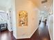 Hallway featuring hardwood floors and a decorative niche with a vase at 5615 Oxford Moor Blvd, Windermere, FL 34786