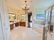 Bright main bathroom with double vanity, soaking tub, and glass enclosed shower at 5615 Oxford Moor Blvd, Windermere, FL 34786