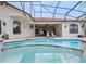 Inviting pool area with a unique shape and surrounding deck, perfect for relaxation and entertainment at 5615 Oxford Moor Blvd, Windermere, FL 34786