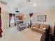 Spacious recreation room boasts a projector, comfortable seating, and a built-in bar area at 5615 Oxford Moor Blvd, Windermere, FL 34786
