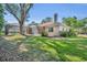 Spacious backyard featuring a screened-in patio and pool, perfect for outdoor relaxation and entertaining at 605 W Palm Valley Dr, Oviedo, FL 32765