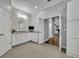 Bathroom features a vanity with granite countertop and an entrance to the bedroom at 605 W Palm Valley Dr, Oviedo, FL 32765