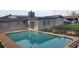 A sparkling in-ground pool surrounded by concrete deck, offering a refreshing outdoor oasis at 7028 Clarcona Ocoee Rd., Orlando, FL 32818