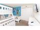 Adorable bedroom with bunk beds, a twin bed, closet, dresser, TV and cute Mickey Mouse decor at 8924 Bengal Ct, Kissimmee, FL 34747