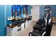 Entertainment room with multiple gaming stations and comfortable seating for players at 8924 Bengal Ct, Kissimmee, FL 34747
