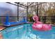 Enjoy the pool with inflatable toys, including flamingo and Splash Net game set, for summertime fun at 8924 Bengal Ct, Kissimmee, FL 34747