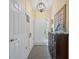 Welcoming entryway with tile flooring, a stylish pendant light, and decorative accents at 903 Oak Leaf Ct, Altamonte Springs, FL 32714