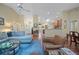 Bright and airy living room with an open layout, skylight, and comfortable seating at 903 Oak Leaf Ct, Altamonte Springs, FL 32714