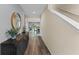 Inviting foyer boasts hard wood floors and staircase leading to the second floor at 984 Commons Way, Port Orange, FL 32129