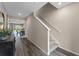 Inviting foyer boasts hard wood floors and staircase leading to the second floor at 984 Commons Way, Port Orange, FL 32129