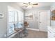 Cozy breakfast nook featuring a charming table and chairs, complemented by natural light from the shutters at 103 Golf Club Dr, Longwood, FL 32779