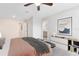 Serene bedroom with a cozy bed, soft lighting, and stylish decor at 10915 Leafshore Loop, Orlando, FL 32829