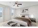 Tranquil bedroom with soft lighting, a cozy bed, and modern decor at 10915 Leafshore Loop, Orlando, FL 32829