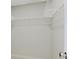 View of walk-in closet with white-coated wire rack shelving at 10915 Leafshore Loop, Orlando, FL 32829
