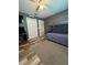 Bedroom featuring bunk beds, wood-look floors, ceiling fan and closet at 11 Pecan Run Ct, Ocala, FL 34472